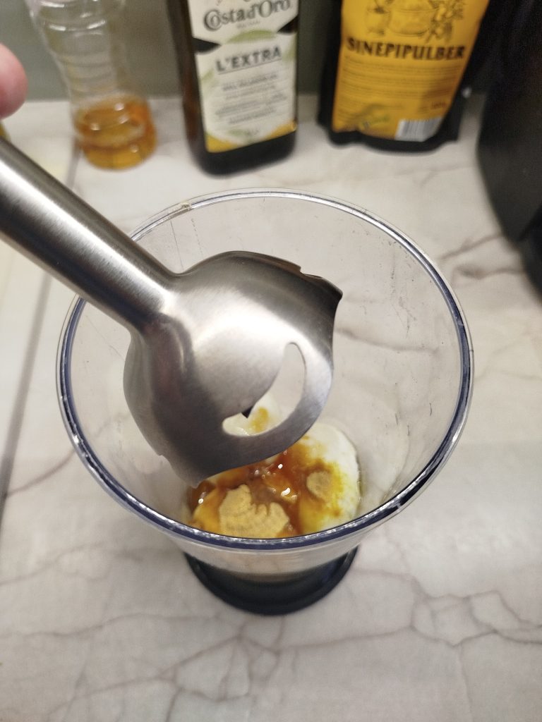 mixing ingredients to make homemade mayonnaise